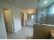 Bathroom featuring a glass-door shower and white vanity at 1528 Maelyn Way, Fuquay Varina, NC 27526