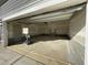 Unfinished two-car garage with interior access at 1528 Maelyn Way, Fuquay Varina, NC 27526