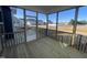 Relaxing screened porch with wooden deck and view at 1528 Maelyn Way, Fuquay Varina, NC 27526