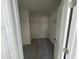 Large walk-in closet with double hanging rods and carpeted floors at 1528 Maelyn Way, Fuquay Varina, NC 27526