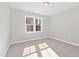 Bedroom with a neutral color scheme and a window at 240 Sequoia Dr, Louisburg, NC 27549