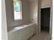 Bathroom with modern vanity awaiting countertops, paint, and fixtures at 2408 Adrift Road, Fuquay Varina, NC 27526