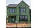 Two-story home under construction with visible ZIP system sheathing and dark framed windows at 2408 Adrift Road, Fuquay Varina, NC 27526