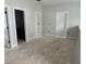 Spacious bonus room offers versatile potential with three entry doors and bare floors at 2412 Adrift Road, Fuquay Varina, NC 27526