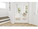 Bright home office with glass doors, natural light, and a serene workspace at 2412 Adrift Road, Fuquay Varina, NC 27526