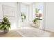 Office with glass desk, plants and natural light at 2412 Adrift Road, Fuquay Varina, NC 27526