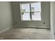 Bright, blank-canvas bedroom awaits your personal touch with a new window, ready for customization at 2412 Adrift Road, Fuquay Varina, NC 27526