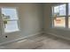 Bright, blank-canvas bedroom with two new windows, awaits your personal touch ready for customization at 2412 Adrift Road, Fuquay Varina, NC 27526