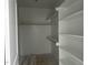 Large walk-in closet with wood shelving, ready for the latest fashions and storage needs at 2412 Adrift Road, Fuquay Varina, NC 27526