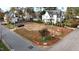Aerial view of a vacant lot ready for new construction, located in a desirable neighborhood at 3301 Dell Dr, Raleigh, NC 27609