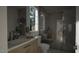 Modern bathroom with a walk-in shower and double vanity at 3301 Dell Dr, Raleigh, NC 27609