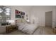 Bright bedroom with a comfortable bed, nightstands, and stylish wall art at 3301 Dell Dr, Raleigh, NC 27609