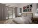 Bright bedroom with sliding glass doors leading to patio at 3301 Dell Dr, Raleigh, NC 27609