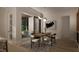 Dining room with sliding glass doors leading to outdoor patio at 3301 Dell Dr, Raleigh, NC 27609