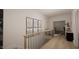 Stylish hallway with hardwood floors and modern wall decor at 3301 Dell Dr, Raleigh, NC 27609