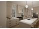 Modern kitchen features white cabinets, marble countertops, and a large island at 3301 Dell Dr, Raleigh, NC 27609