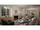 Living room features a fireplace, built-in shelving, and large windows at 3301 Dell Dr, Raleigh, NC 27609