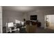 Modern living room with stylish furniture and TV at 3301 Dell Dr, Raleigh, NC 27609