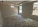 Neutral bedroom with large windows providing lots of natural light at 2400 Adrift Rd, Fuquay Varina, NC 27526