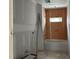 Bathroom during construction with bathtub, window, and orange waterproofing membrane at 2404 Adrift Rd, Fuquay Varina, NC 27526