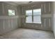 Bedroom during construction with two windows providing ample natural light at 2404 Adrift Rd, Fuquay Varina, NC 27526