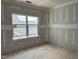 Bedroom during construction phase featuring a window with rooftop view at 2404 Adrift Rd, Fuquay Varina, NC 27526