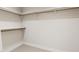 Spacious walk-in closet with ample shelving and rod space for organized storage at 2404 Adrift Rd, Fuquay Varina, NC 27526
