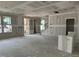 Bright living room featuring drywall, recessed lighting, a staircase, and many windows at 2404 Adrift Rd, Fuquay Varina, NC 27526