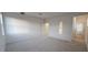 Bright bedroom with carpeted floors and natural light at 111 Brodhead Dr, Fuquay Varina, NC 27526