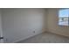 A bright bedroom with a large window offers a tranquil space at 111 Brodhead Dr, Fuquay Varina, NC 27526