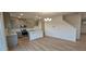 Open kitchen features stainless appliances and a central island at 111 Brodhead Dr, Fuquay Varina, NC 27526