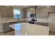 Modern kitchen featuring stainless appliances, quartz counters, and ample storage at 111 Brodhead Dr, Fuquay Varina, NC 27526