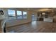 Bright living area with large windows and sliding glass doors at 111 Brodhead Dr, Fuquay Varina, NC 27526