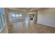 Spacious, open-concept living area with kitchen and staircase at 111 Brodhead Dr, Fuquay Varina, NC 27526