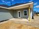 Backyard featuring a covered patio and a spacious yard at 210 Drayton Hall Ln, Sanford, NC 27330