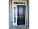 Close-up of the home's black front door with white trim at 210 Drayton Hall Ln, Sanford, NC 27330