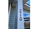 Close-up of a homes elegant black house number, '210' at 210 Drayton Hall Ln, Sanford, NC 27330