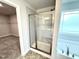 A bathroom with a shower and a bathtub at 315 Bishop Ln, Sanford, NC 27330