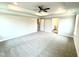 A spacious bedroom with carpet and two doorways at 315 Bishop Ln, Sanford, NC 27330
