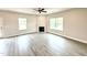 Bright living room with fireplace, neutral colors, and hardwood floors at 315 Bishop Ln, Sanford, NC 27330