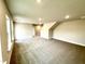 Bright and airy living room features neutral paint, carpet flooring, and recessed lighting at 315 Bishop Ln, Sanford, NC 27330
