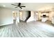 Open-concept living space with stairs, kitchen, and modern finishes at 315 Bishop Ln, Sanford, NC 27330