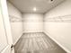 A large walk-in closet with carpet and wire shelving at 315 Bishop Ln, Sanford, NC 27330