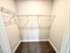 Walk-in closet offers ample storage with white wire shelving at 315 Bishop Ln, Sanford, NC 27330