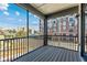 Private deck with city views and screened-in porch at 710 W North St # 101, Raleigh, NC 27603