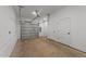 A clean garage features a modern door and plenty of storage space at 710 W North St # 101, Raleigh, NC 27603