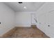 Unfinished garage with concrete floor and ample storage at 710 W North St # 101, Raleigh, NC 27603