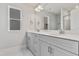 Luxurious bathroom with double vanity, quartz countertop, and modern fixtures at 757 Portland Rose Dr, Knightdale, NC 27545