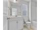 Bathroom featuring vanity, toilet, shower and natural light at 757 Portland Rose Dr, Knightdale, NC 27545