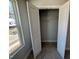 Bedroom closet with shelving and great backyard view at 757 Portland Rose Dr, Knightdale, NC 27545